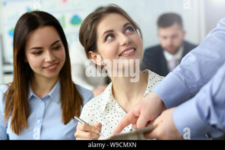 Pretty colleagues in high-tech building Stock Photo