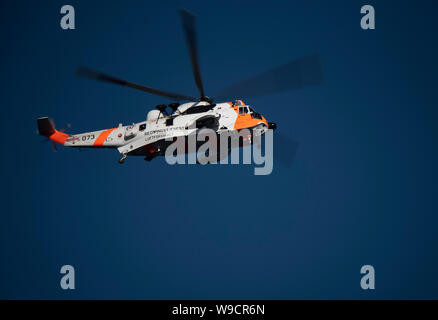 Westland Sea King of 330 squadron, Royal Norwegian Air Force, operating off the Lofoten Islands, Norway. Stock Photo