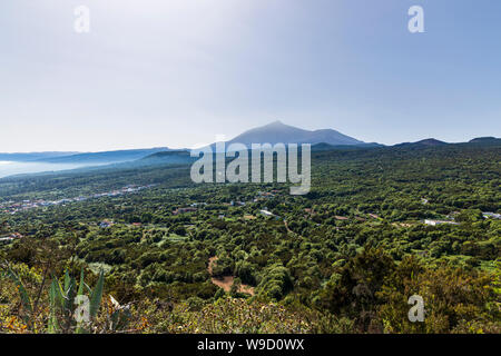 Heat haze over Teide volcano in summer viewed from El Tanque, Tenerife, Canary Islands, Spain Stock Photo