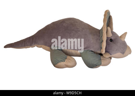 Dinosaur Triceratops plush soft toy isolated on white background Stock Photo