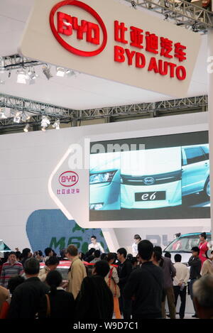 --FILE--Visitors crowd at the stand of BYD during the 10th China ...