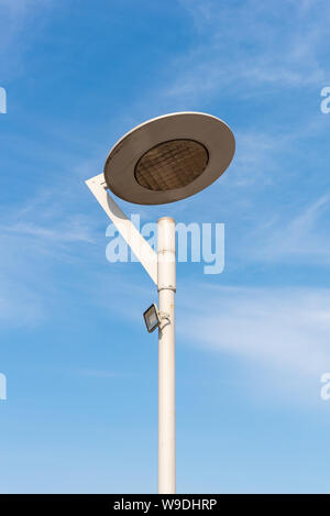 LED lighting pole new technoly of lighting system with blue sky on outdoor street walkway. Stock Photo