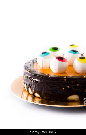 Halloween cake with candy eyes decoration isolated on white background Stock Photo