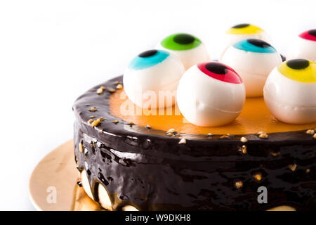 Halloween cake with candy eyes decoration isolated on white background Stock Photo