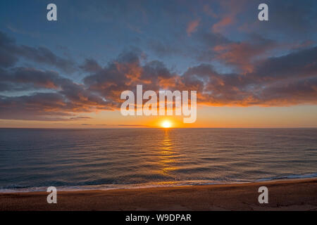 Sunrise over sea Stock Photo - Alamy