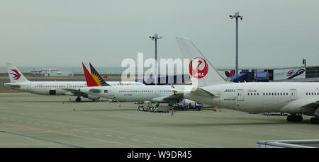 Nagoya, Japan - Mar 19, 2018. Passenger airplane docking at Chubu Centrair Airport (NGO) in Nagoya, Japan. Stock Photo