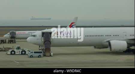 Nagoya, Japan - Mar 19, 2018. Passenger airplane docking at Chubu Centrair Airport (NGO) in Nagoya, Japan. Stock Photo