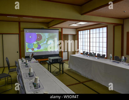 Kyoto, Japan - May 18, 2018. Meeting room with chairs and a electric board of luxury hotel in Kyoto, Japan. Stock Photo