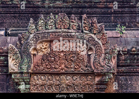 Stone carvings at Banteay Srei temple area of Angkor in Siem Reap, Cambodia Stock Photo