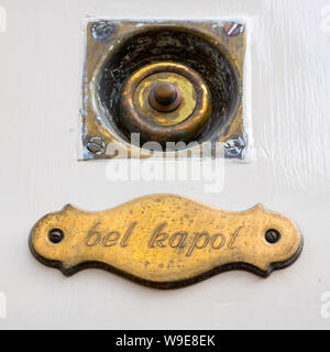 Leiden, Holland - July 05, 2019: Traditional old copper doorbell with the sign bell does not work Stock Photo