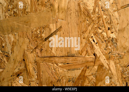 background, texture - surface of rough chipboard close-up Stock Photo