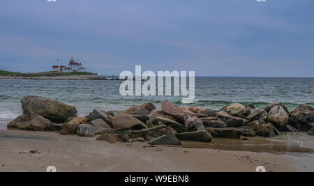 Watch Hill Lighthouse, Rhode Island, USA - May 5, 2018: Watch Hill Lighthouse in the sunset of a cloudy day Stock Photo