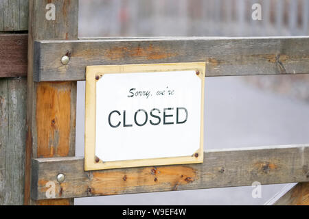 Sorry we are closed farm shop sign on wooden gate Stock Photo