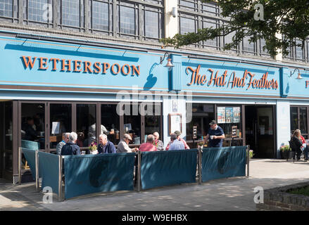 Group Of People Sitting Outside Pub Drinking And Relaxing In Summer Stock Photo Alamy