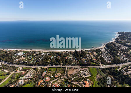 Aerial of ocean view mansions, homes and estates along Pacific Coast Highway in scenic Malibu, California. Stock Photo