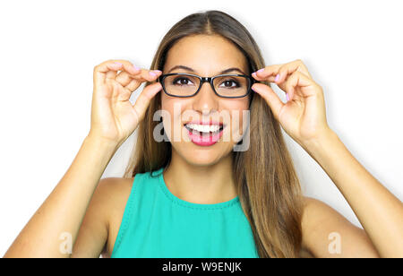Eyewear glasses woman portrait. Smiling young woman wearing glasses and holding frame. Beautiful female model on violet background. Stock Photo
