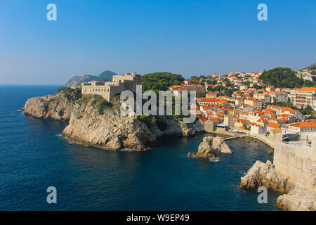 Dubrovnik from the surrounding Adriatic Sea viewing the ancient city wall surrounding the city with Fort Lovrijenac, Dubrovnik in Croatia, Europe Stock Photo