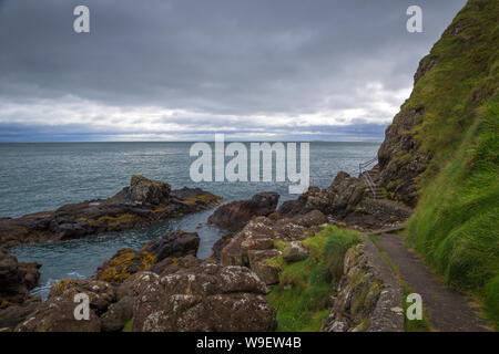 spectacular cliff walk at the Blackhead Lighthouse, Co Antrim, Northern Ireland Stock Photo