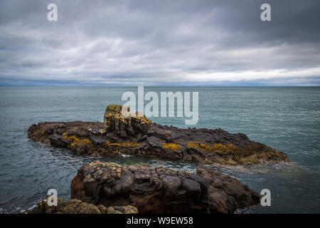 spectacular cliff walk at the Blackhead Lighthouse, Co Antrim, Northern Ireland Stock Photo