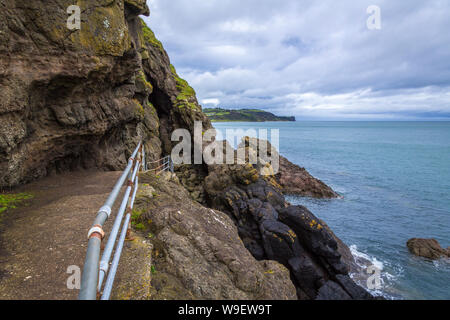 spectacular cliff walk at the Blackhead Lighthouse, Co Antrim, Northern Ireland Stock Photo