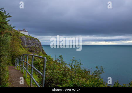 spectacular cliff walk at the Blackhead Lighthouse, Co Antrim, Northern Ireland Stock Photo