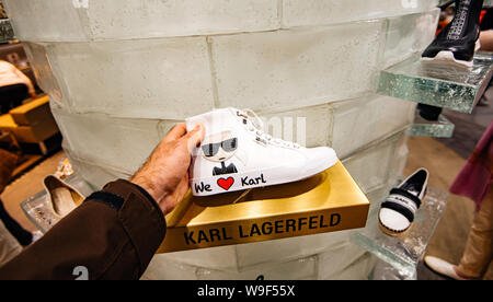 Strasbourg France May 18 2019 man hand shopping buying in shopping center with We Love karl sport sneakers and logotype Karl Lagerfeld on the stand Stock Photo Alamy