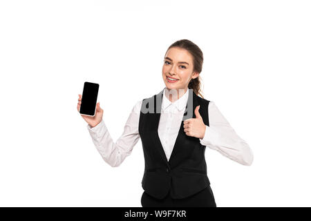 happy young waitress holding smartphone with blank screen and showing thumb up isolated on white Stock Photo