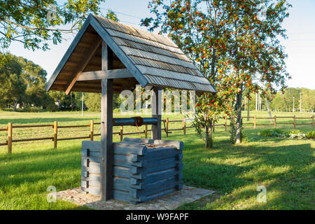 Retro wooden well water Stock Photo