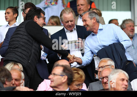 Former Ipswich Town player and manager, George Burley (right) greets Mick Harford and Former Chairman, David Sheepshanks - Ipswich Town v Sunderland, Sky Bet League One, Portman Road, Ipswich, UK - 10th August 2019  Editorial Use Only - DataCo restrictions apply Stock Photo