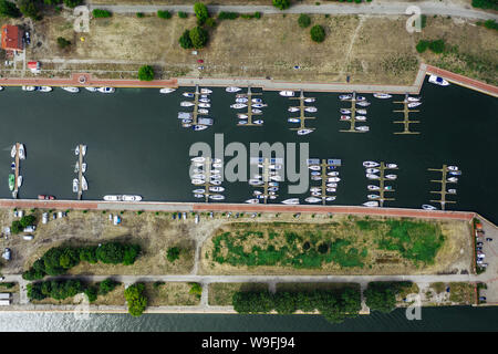 Aerial drone photography of a bay, stationary yachts and other vessels. Stock Photo