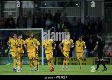 Kingston Upon Thames, UK. 13th Aug, 2019. David Kasumu of Milton Keynes Dons (5L) celebrates with teammates after scoring his team's second goal. Carabao cup, EFL Cup 1st round match, AFC Wimbledon v MK Dons at the Cherry Red Records Stadium in Kingston upon Thames, Surrey on Tuesday 13th August 2019. this image may only be used for Editorial purposes. Editorial use only, license required for commercial use. No use in betting, games or a single club/league/player publications. pic by Steffan Bowen/Andrew Orchard sports photography/Alamy Live news Stock Photo