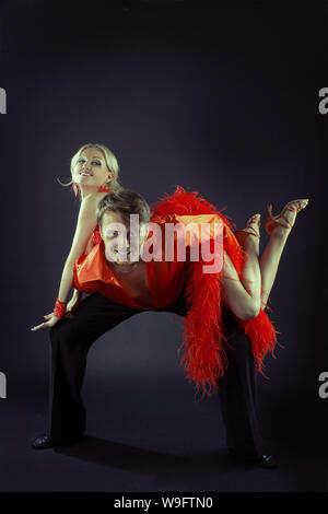 Ballroom dancing Latin American dancers in red dress, best ballroom Stock Photo