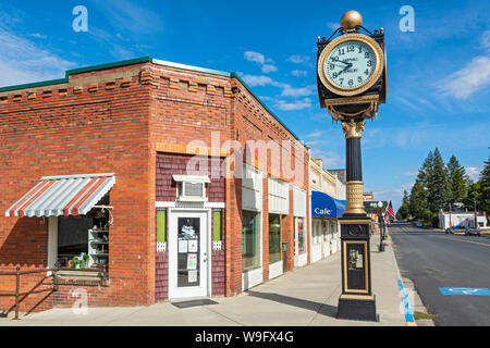 Washington, Palouse Region, Rosalia, Historic Downtown, large four face clock mounted on sidewalk pedestal Stock Photo