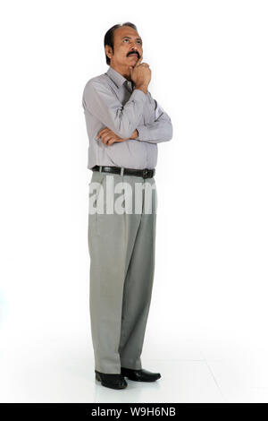 Mature man thinking Stock Photo