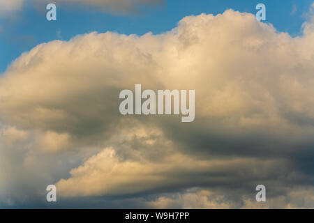 Beautiful summer cloudscape - stunning clouds floating across sky to change weather. Natural meteorology abstract background. Atmospheric and optical Stock Photo
