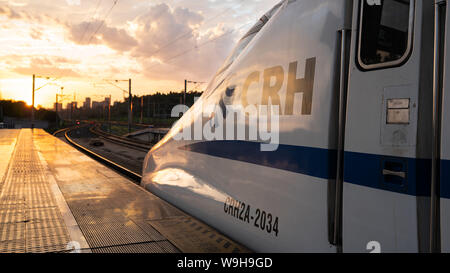 Yichang China, 11 August 2019 : Head of a CRH Chinese bullet train at sunset at Yichang station in China