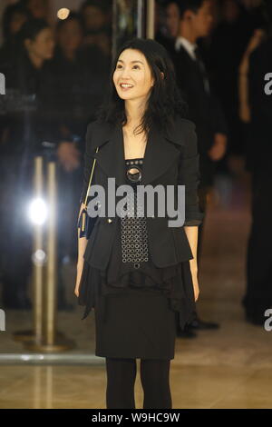 Hong Kong actress Maggie Cheung poses during opening ceremony of a Lane Crawford shopping center, in Beijing, October 27, 2007. Stock Photo