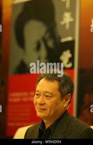 Taiwanese director Ang Lee poses during a promotional event for his book in Beijing, December 26, 2007. Stock Photo