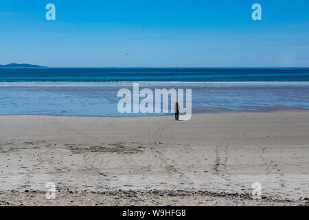 Holiday makers on Keel Beach enjoying the summer sun, Achill Island, County Mayo, Ireland Stock Photo