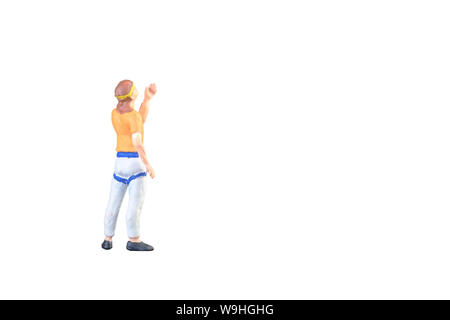 Close up of Miniature people doing climbing sport isolated with clipping path on white background Stock Photo