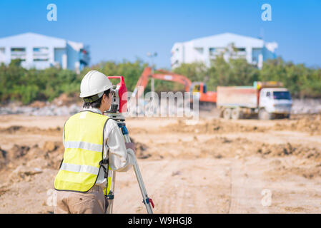 Asian construction engineer checking construction site for new Infrastructure project. Stock Photo