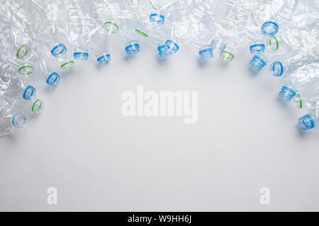 Frame of used plastic bottles background. Recycle concept Stock Photo