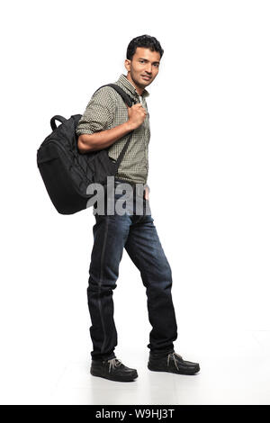 Young traveller with backpack isolated on white Stock Photo - Alamy