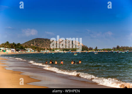 Locals people  swimming  in the sea, near Saigon Ninh Chu Resort on Phan Rang Beach,south china sea, Ninh Thuan, Vietnam, 30074588 Stock Photo