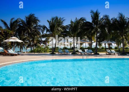 Swimming pool of Saigon Ninh Chu Resort on Phan Rang Beach,south china sea, Ninh Thuan, Vietnam, 30074582 Stock Photo