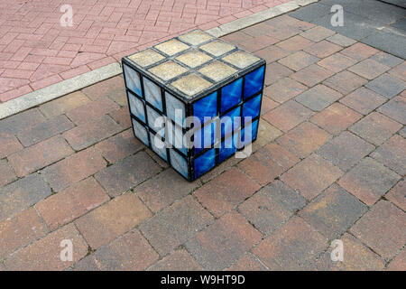 squares stone cube placed on the street Stock Photo