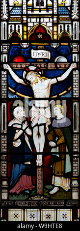 Victorian stained glass window, Tidworth south church, Wiltshire, England, UK by Clayton and Bell, Crucifixion Stock Photo