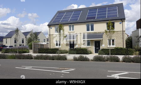 New contemporary sustainable low energy housing development with solar panels, rainwater harvesting, triple glazing, and attractive community spaces Stock Photo