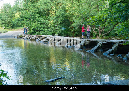 The Tarr steps Bridge on the Barle river, in Exmoor Stock Photo