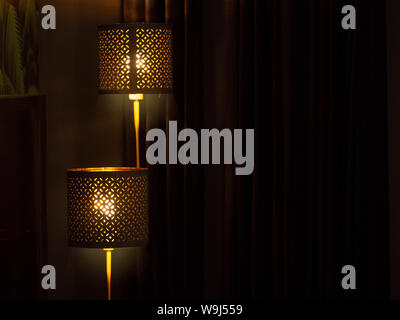 Two vintage lamp on dark background, Open the lamp, Warm tone light Stock Photo